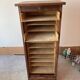 Small curtain filing cabinet.