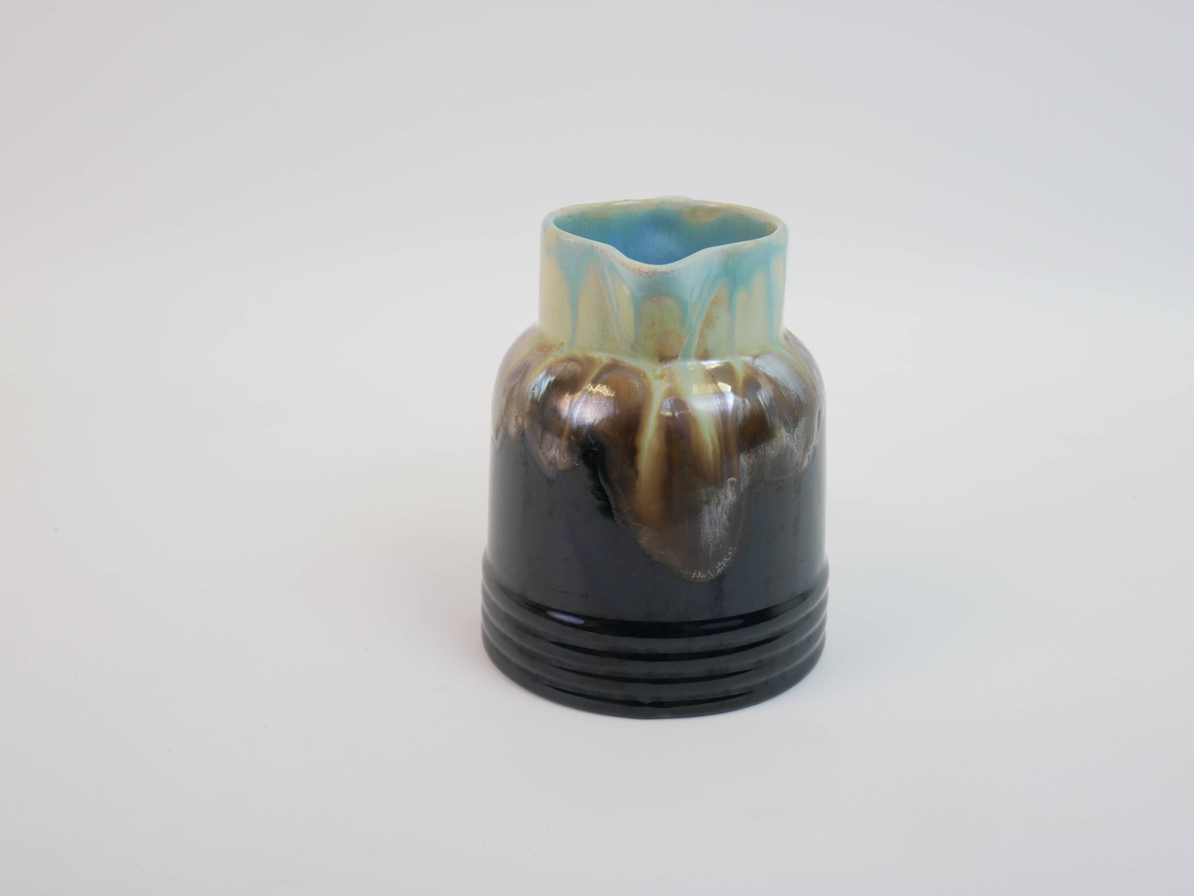 Art Deco pitcher in black, brown and blue glazed ceramic