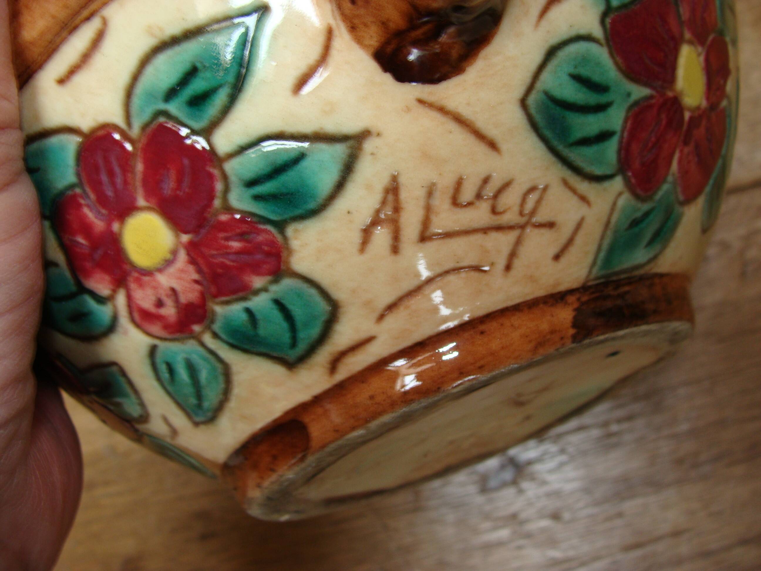 Antique engraved and enamelled ceramic cup