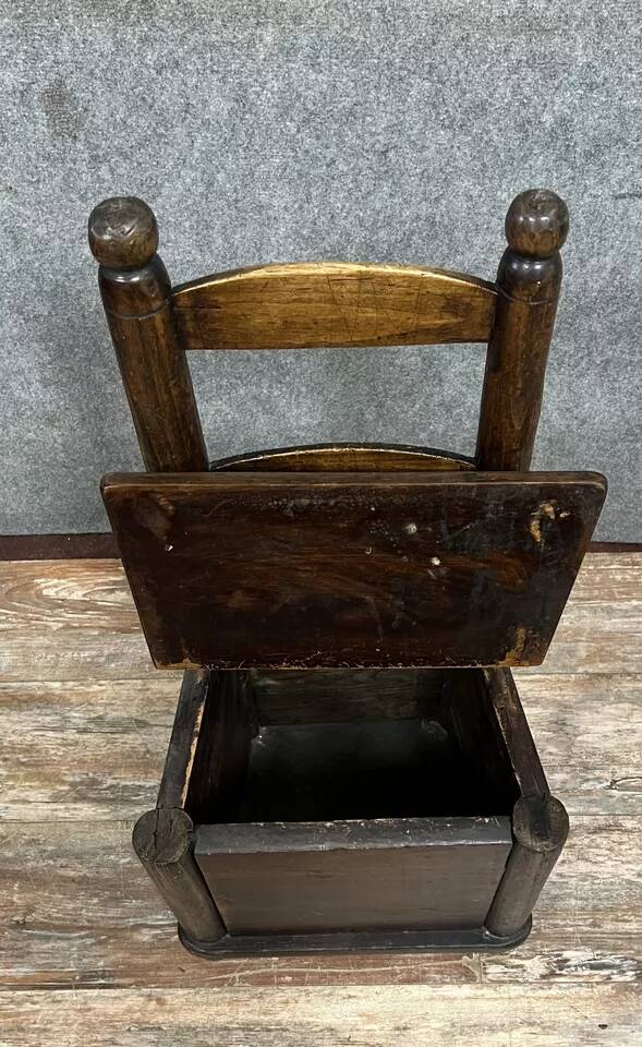 Late 18th century folk art work: child's armchair concealing a chest