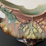 Old earthenware planter. Floral patterns.