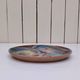Ceramic plate with a bird, signed, vintage