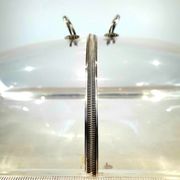 Large serving platter with lid, in silver metal.
