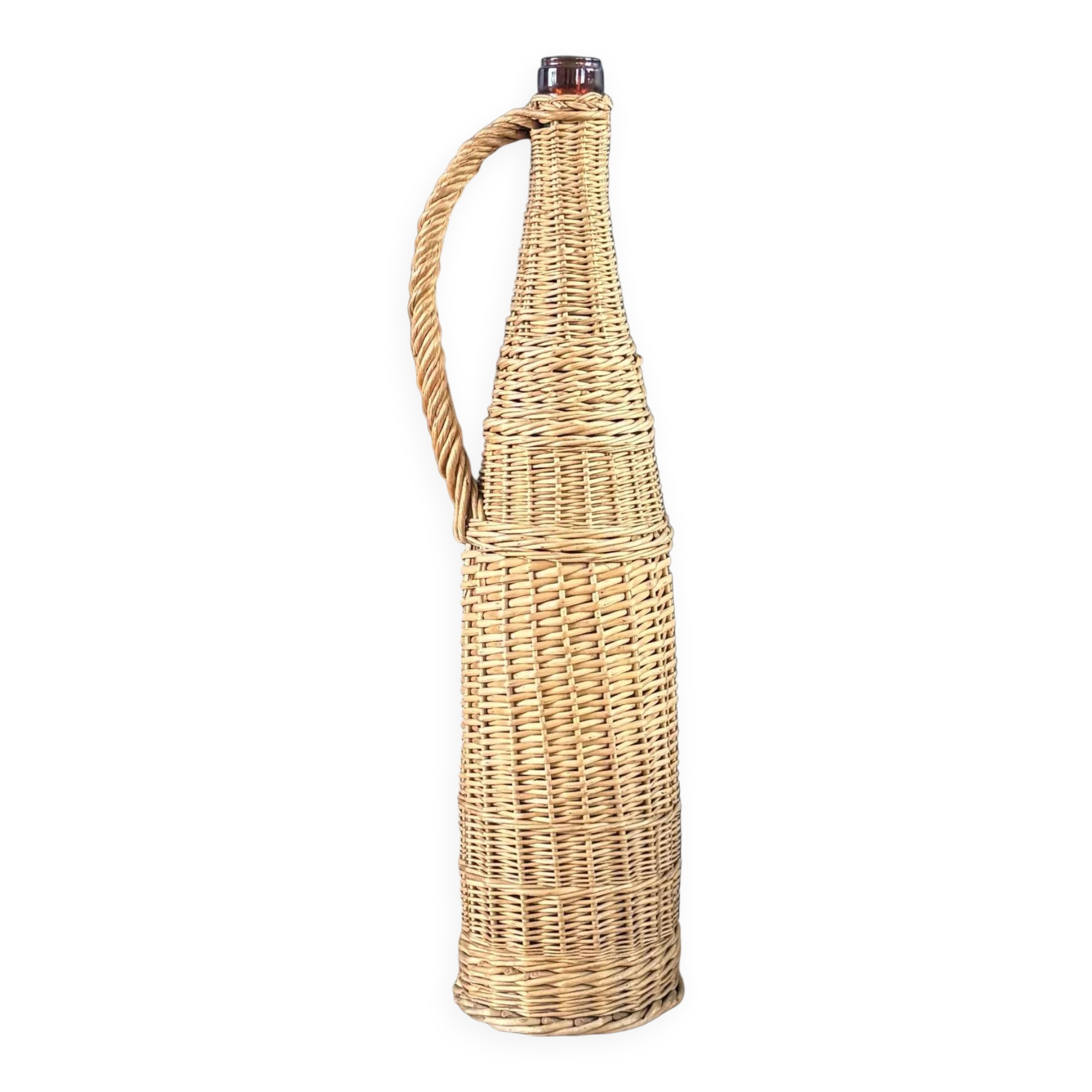 Amber glass bottle in its wicker handle basket.