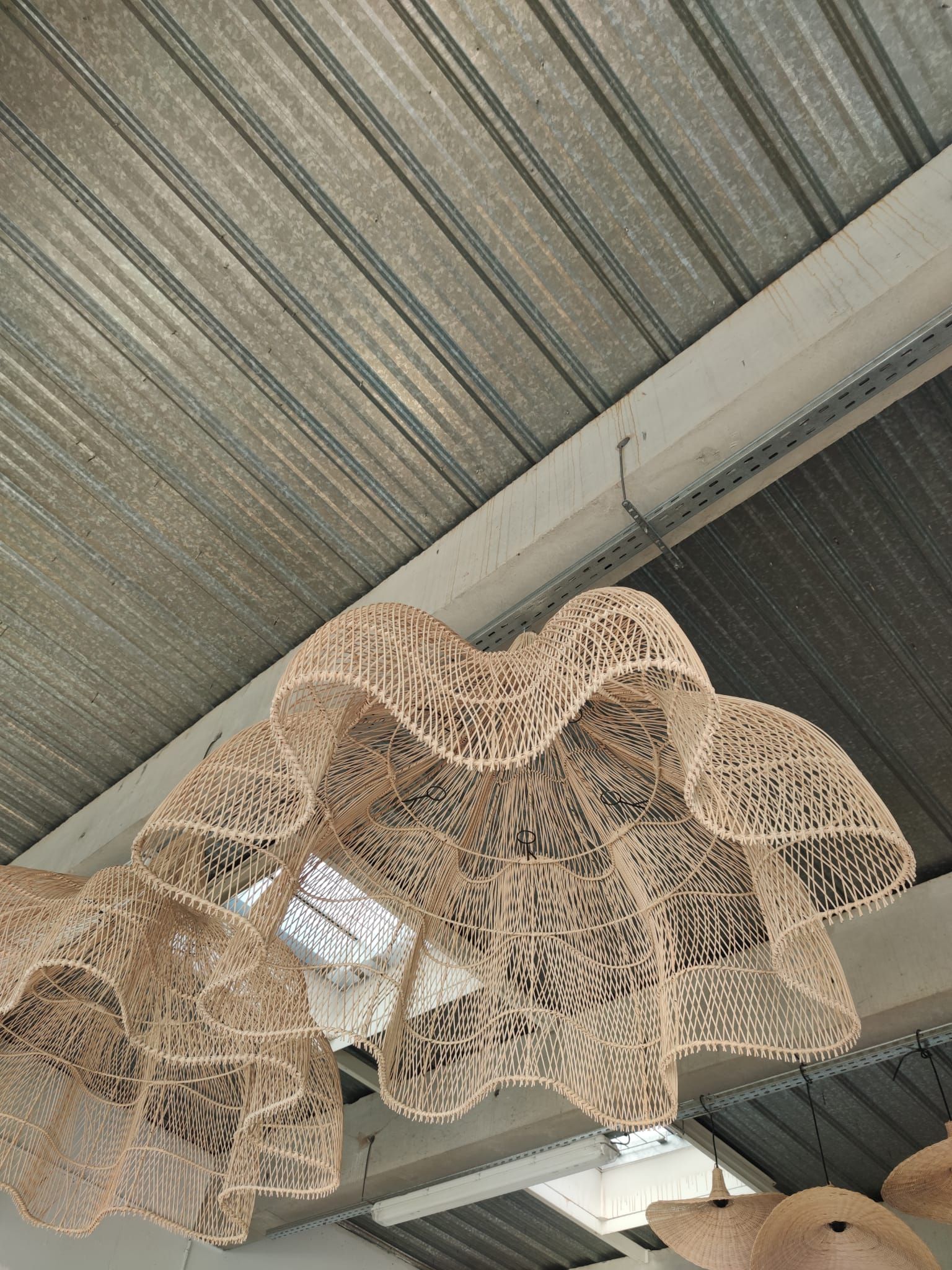 Huge rattan suspension in the shape of a corolla H:1m; D: 1m50