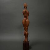 Carved wooden sculpture of a woman by Calin Hentea, 20th century