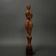 Carved wooden sculpture of a woman by Calin Hentea, 20th century