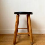 Light and black wooden stool
