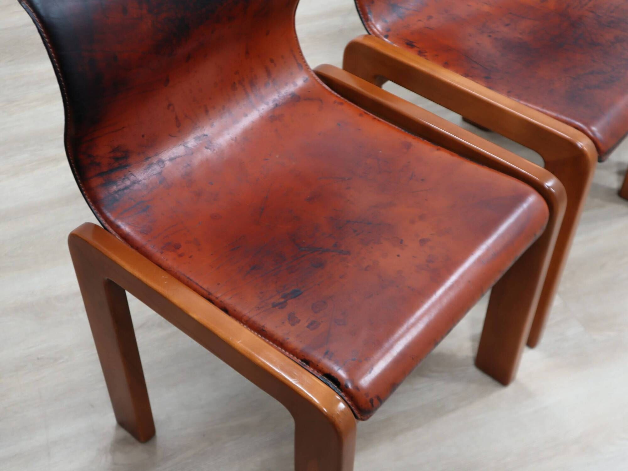Curved wooden and leather chairs by Afra and Tobia Scarpa from the 1970s, set of 4.