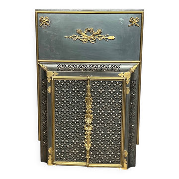 Fireplace screen. Bronze, copper, metal, gilding.