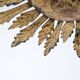 Mid-century sun ceiling lamp in gilded metal with leaf rays, 1950s