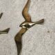 Couple d'hirondelles murales vintage en laiton