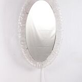 Large Oval Plexiglas mirror with lighting, 1960 Germany.