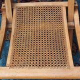 Cane folding armchair in solid wood