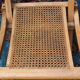 Fauteuil pliant canné en bois massif