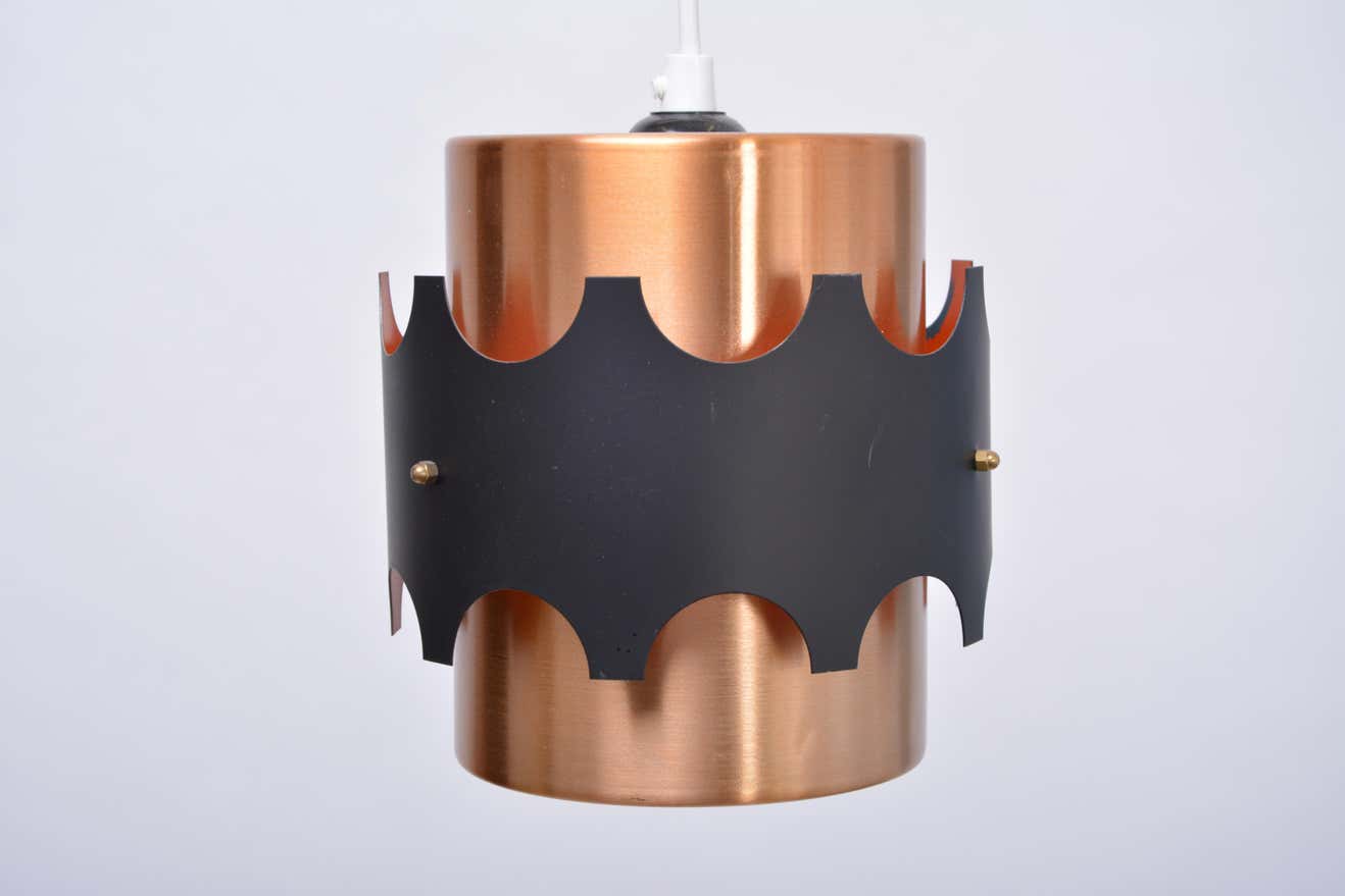 Set of two mid-century copper-colored German pendant lamps