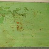 Green garden table in patinated metal