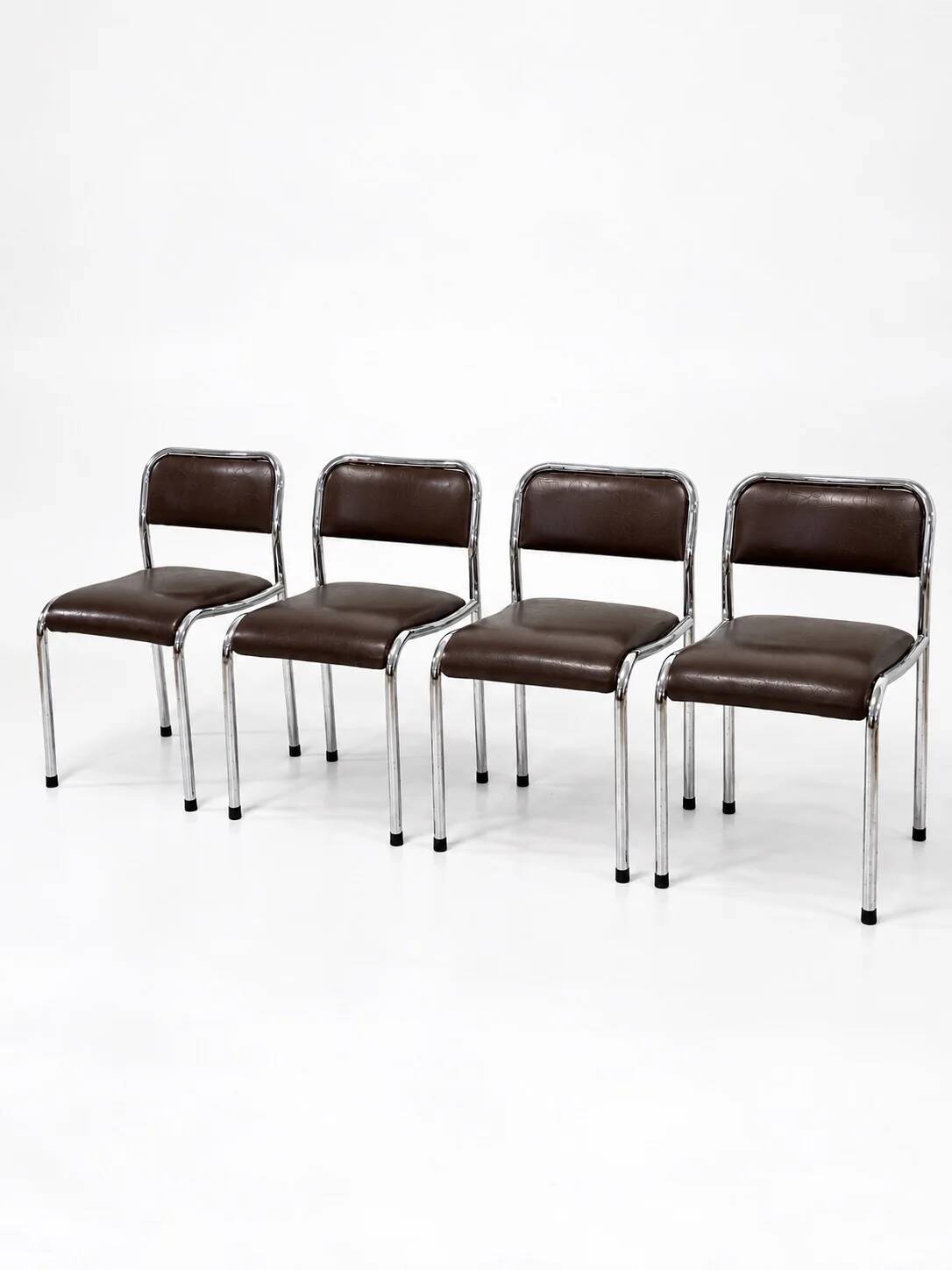 Set of 4 vintage dining chairs in chrome, brown faux leather, 1970s.