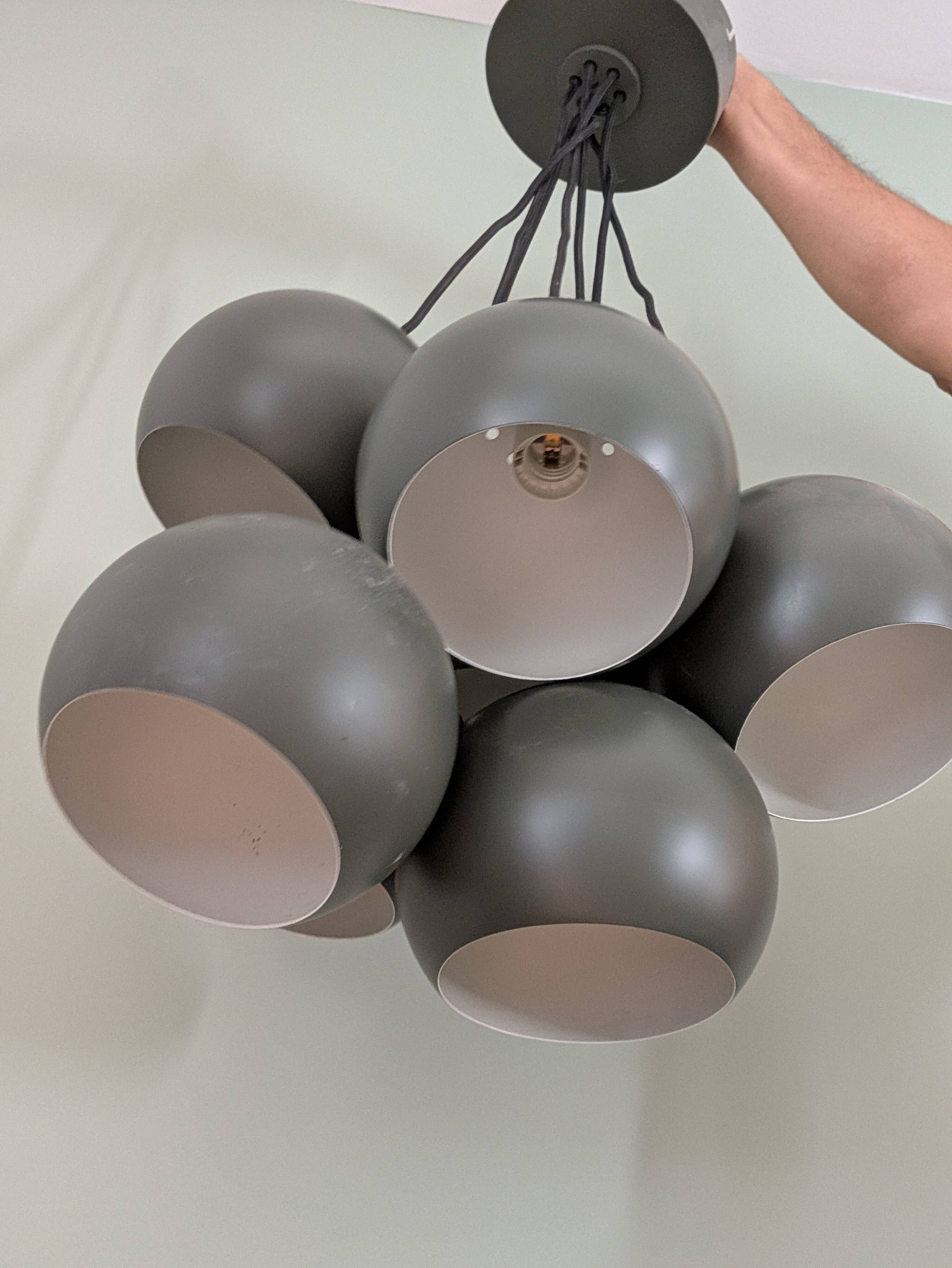 Khaki lamp with 7 bulbs.