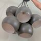 Khaki lamp with 7 bulbs.