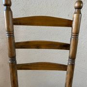 Old turned and stuffed wooden chair