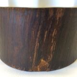 White vase on wooden base