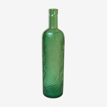 Textured glass wine bottle