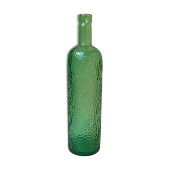 Textured glass wine bottle