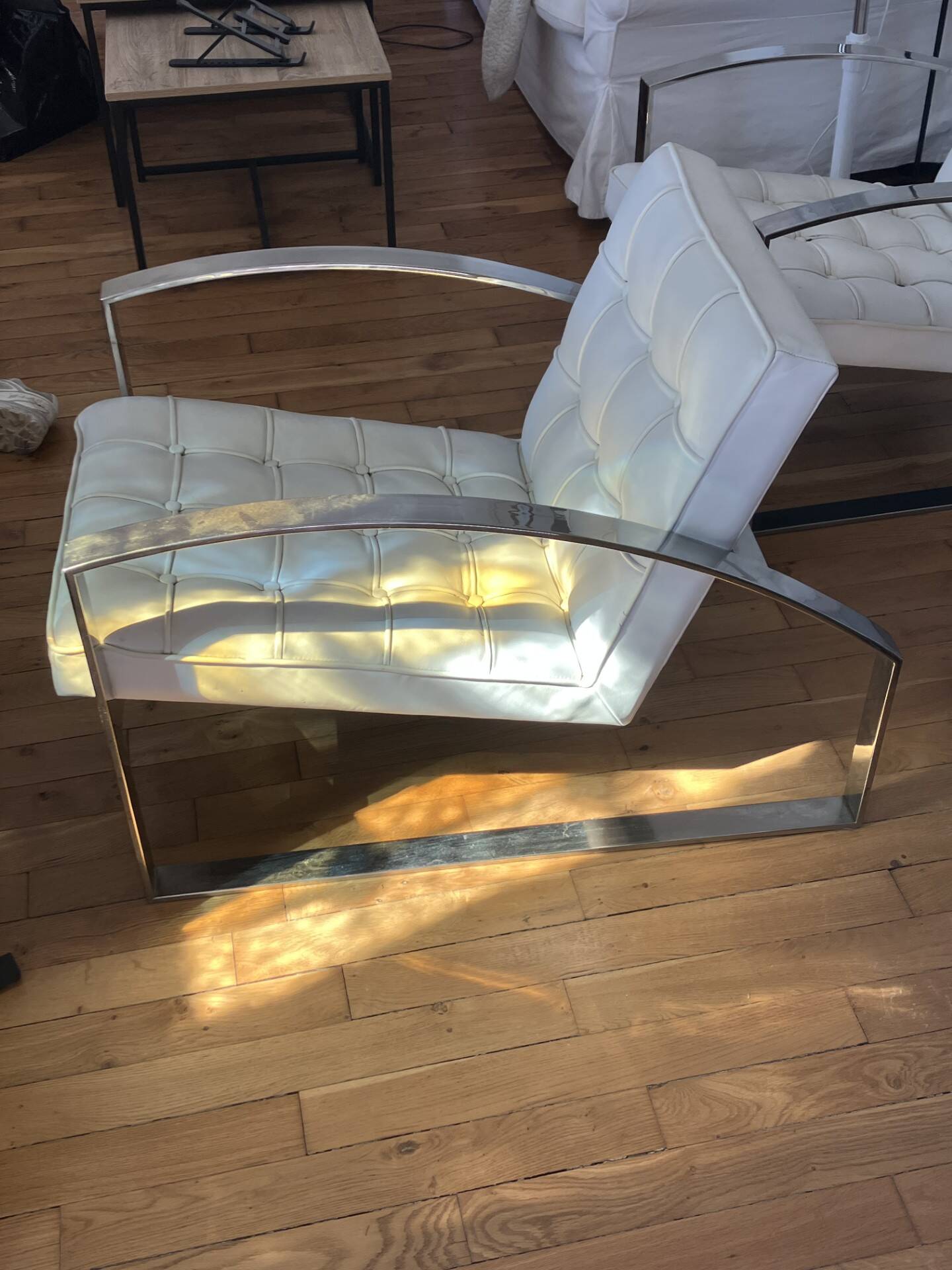 Meridiani armchair — italian design, chrome steel and tufted white leather.