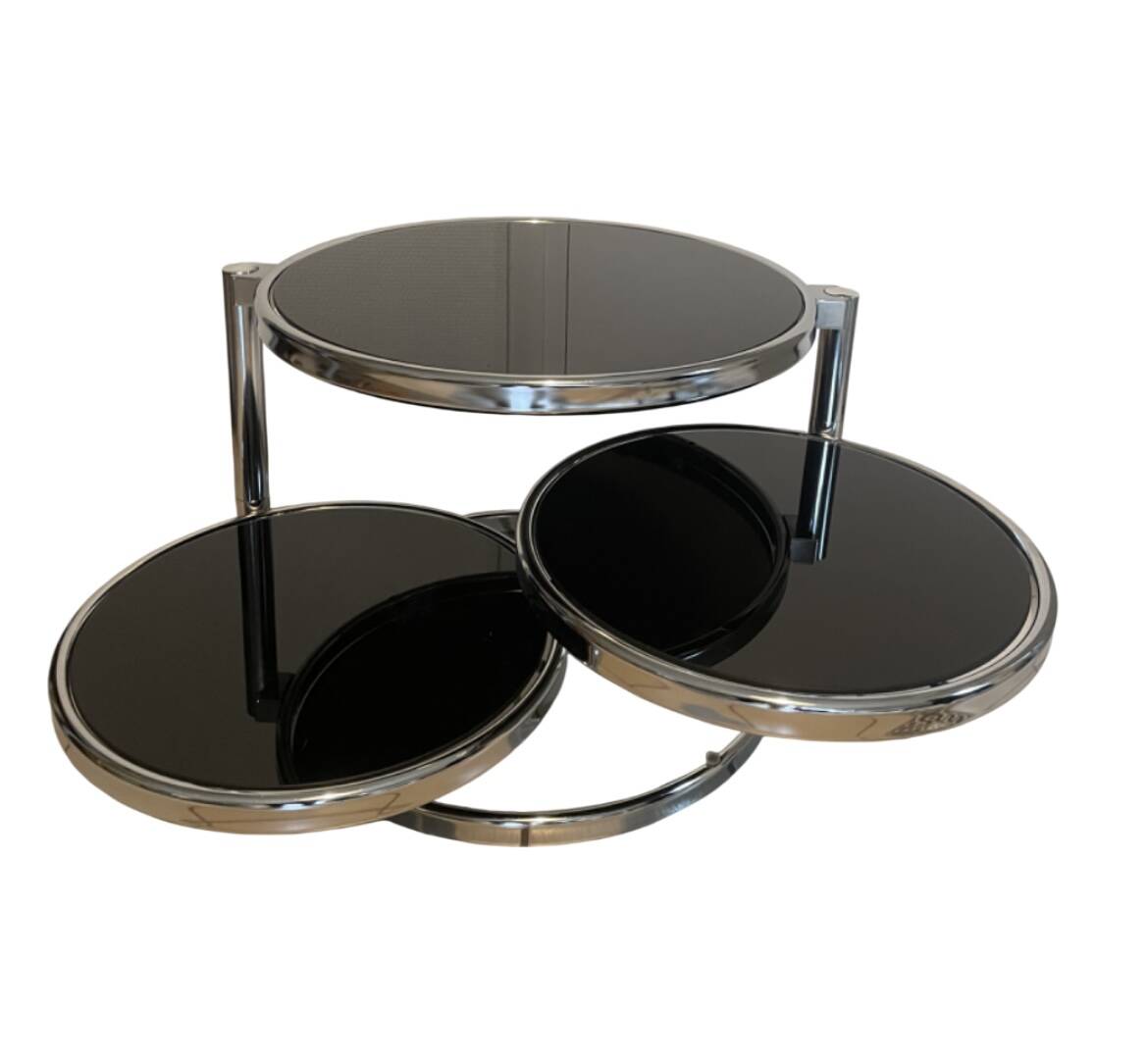 Coffee table with 3 chrome and smoked glass tops.