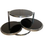 Coffee table with 3 chrome and smoked glass tops.