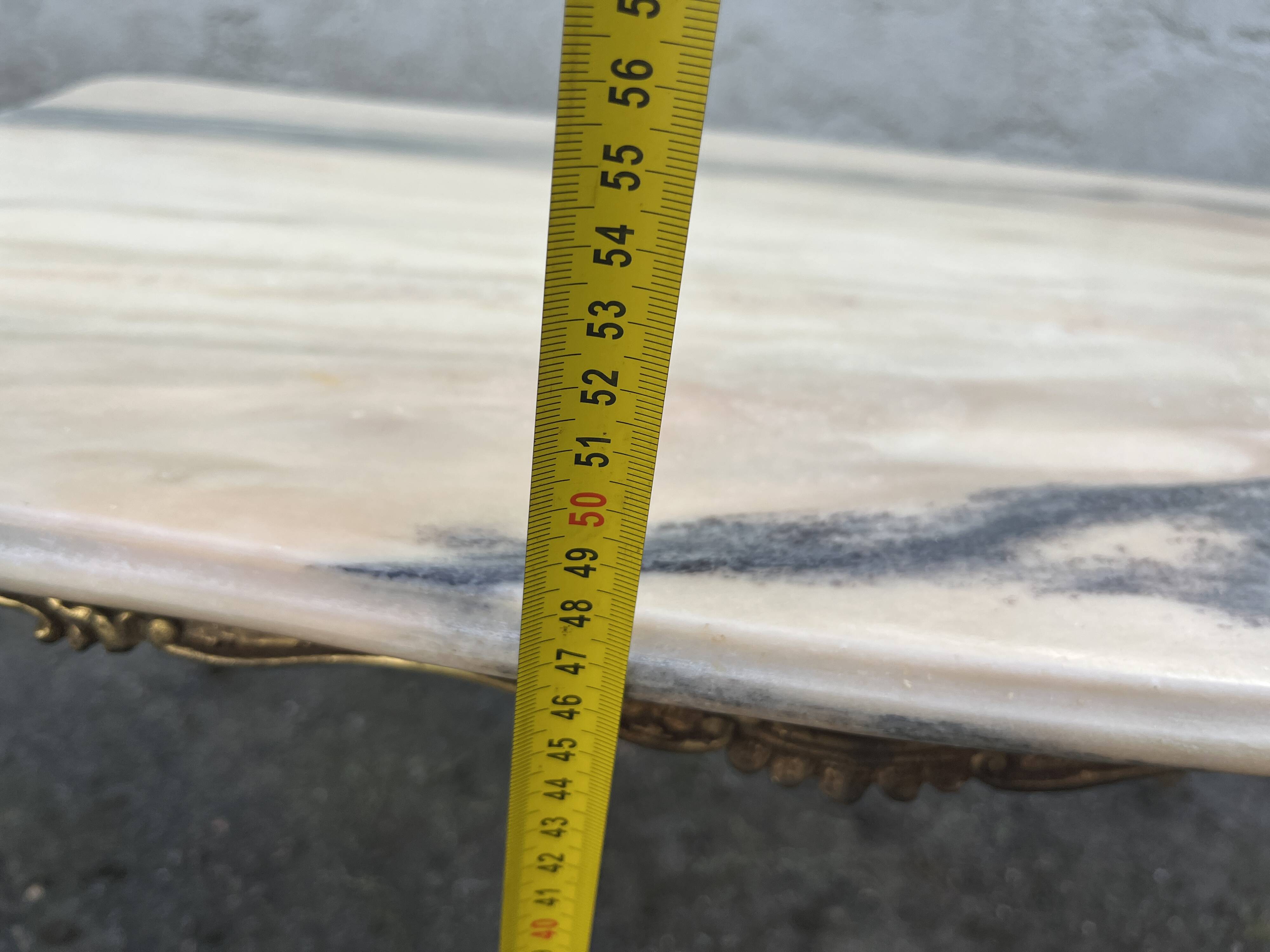 Gilded brass coffee table with onyx top