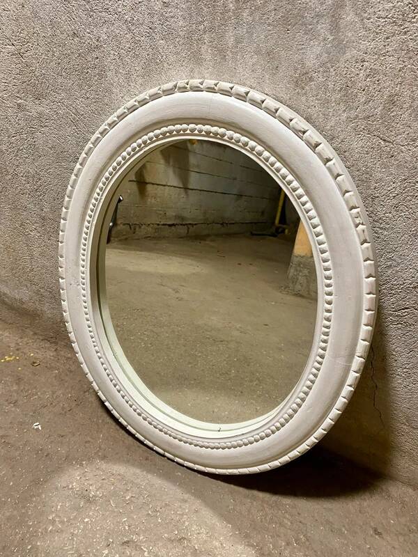 Oval white mirror