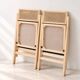 Paire de chaises pliantes en cannage et bois