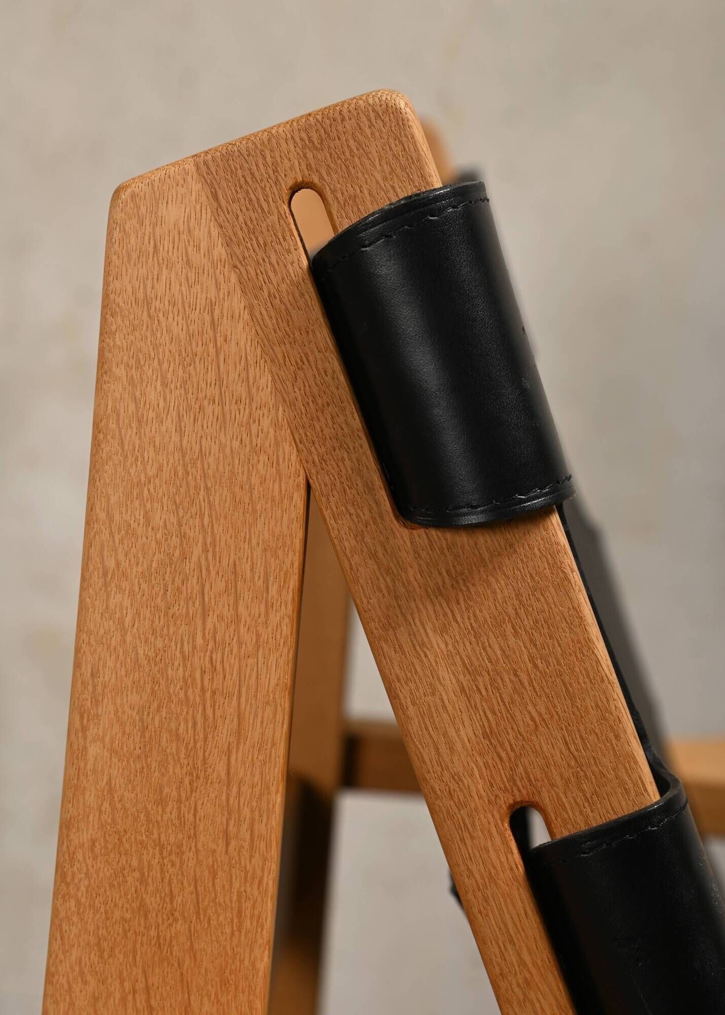 Kurt Østervig hunting chair in black leather for K. P. Jørgensens Møbelfabrik