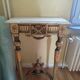 Golden wood and marble console in neoclassical style