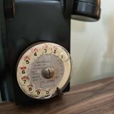 Old bakelite wall telephone