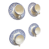Set of 4 cups with white and blue saucers