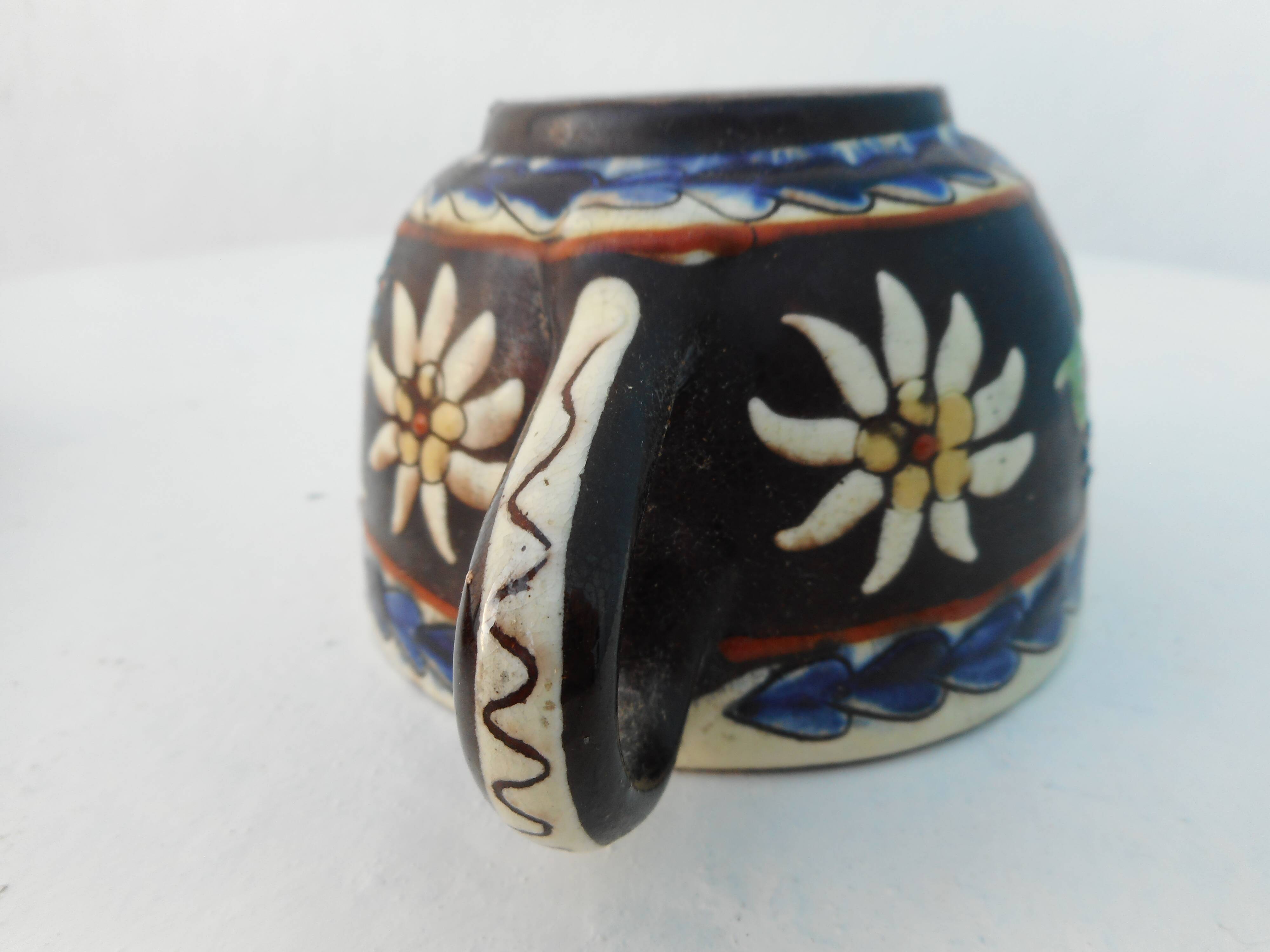 Ceramic cup and undercup