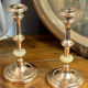 Pair of brass and stone candlesticks