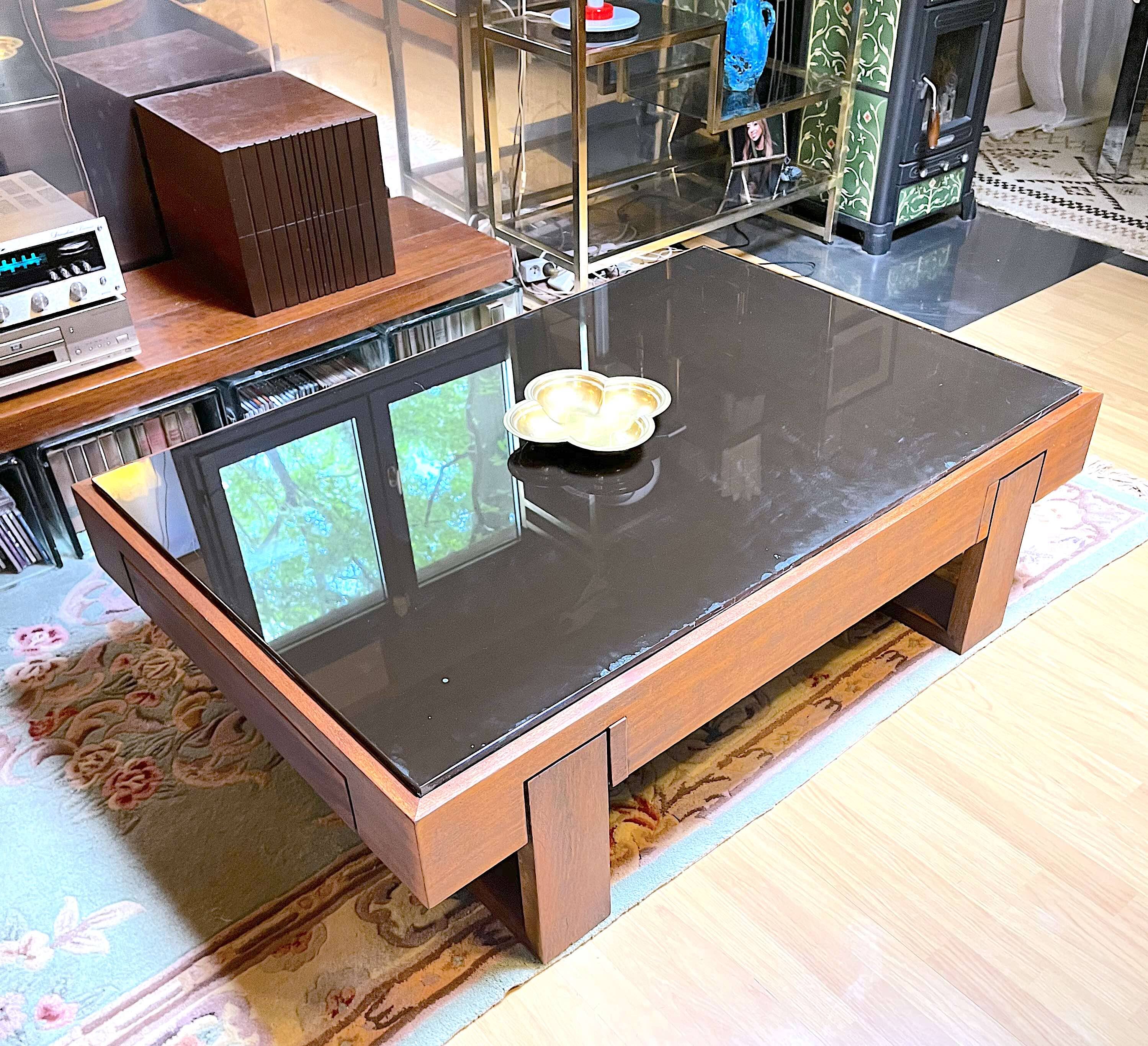Rosewood coffee table, with black glass top, Brazil 1970