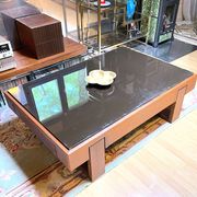 Rosewood coffee table, with black glass top, Brazil 1970