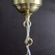 Brass pendant light with oversized LED bulb