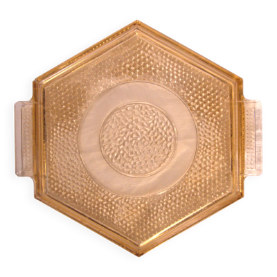 Plat art-déco hexagonal en verre pressé rose-orangé, 27cm