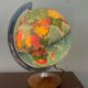 Bright vintage world map with wooden foot