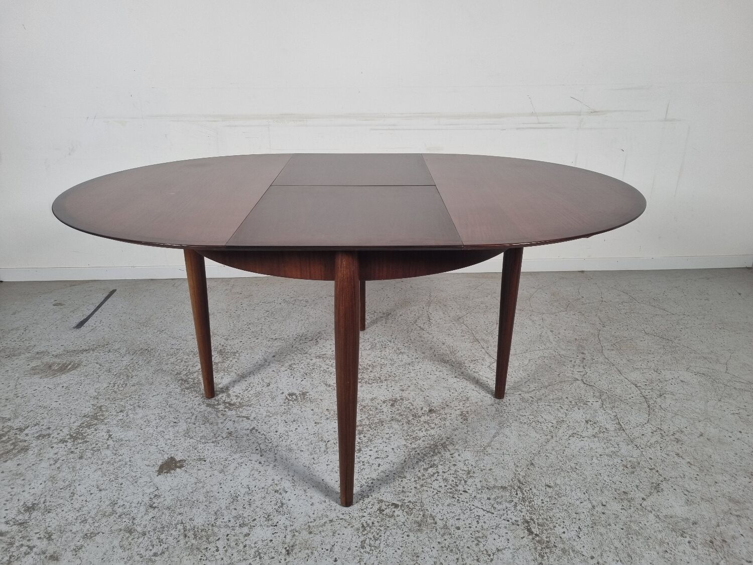 Lubke round rosewood dining table, 60s