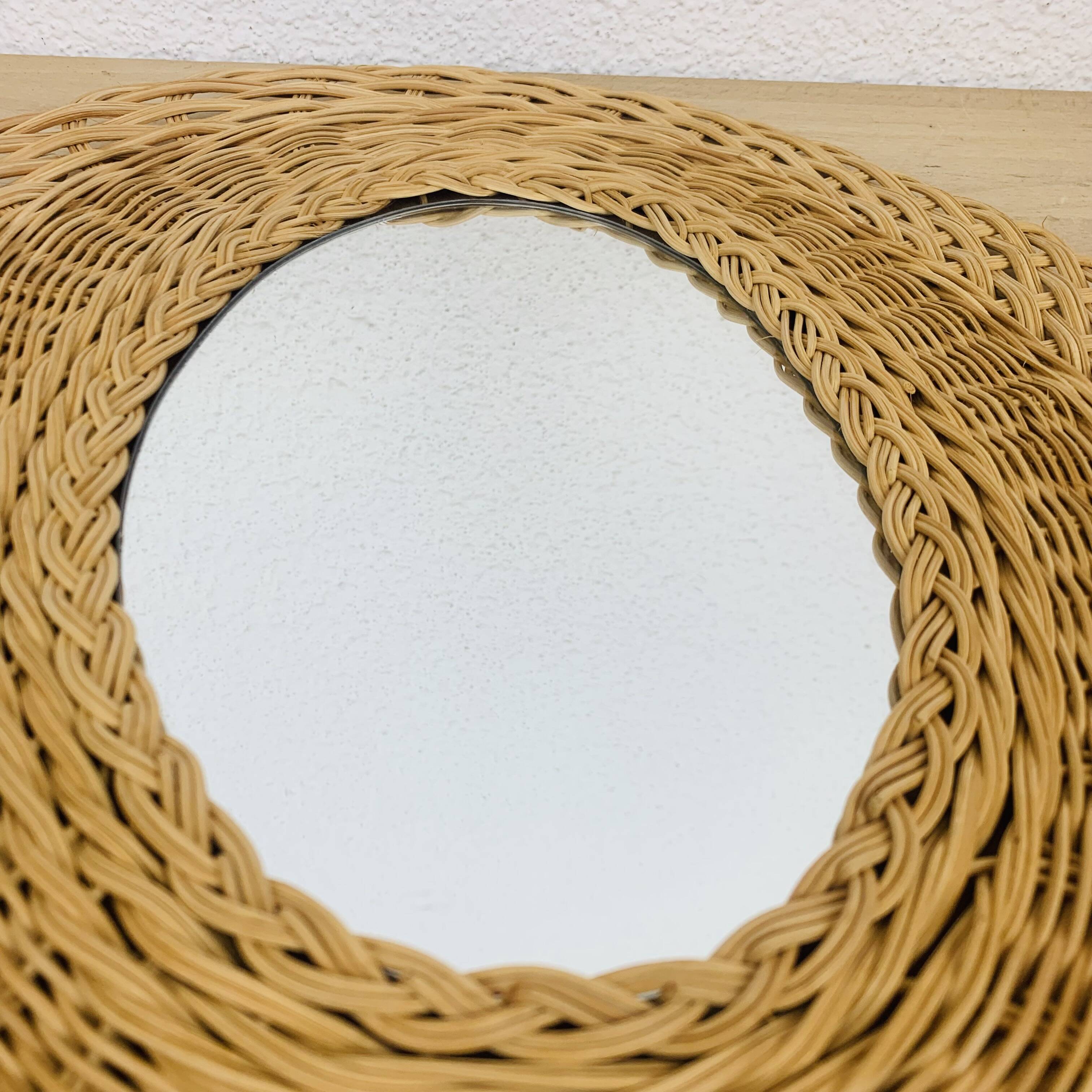 Vintage oval rattan mirror