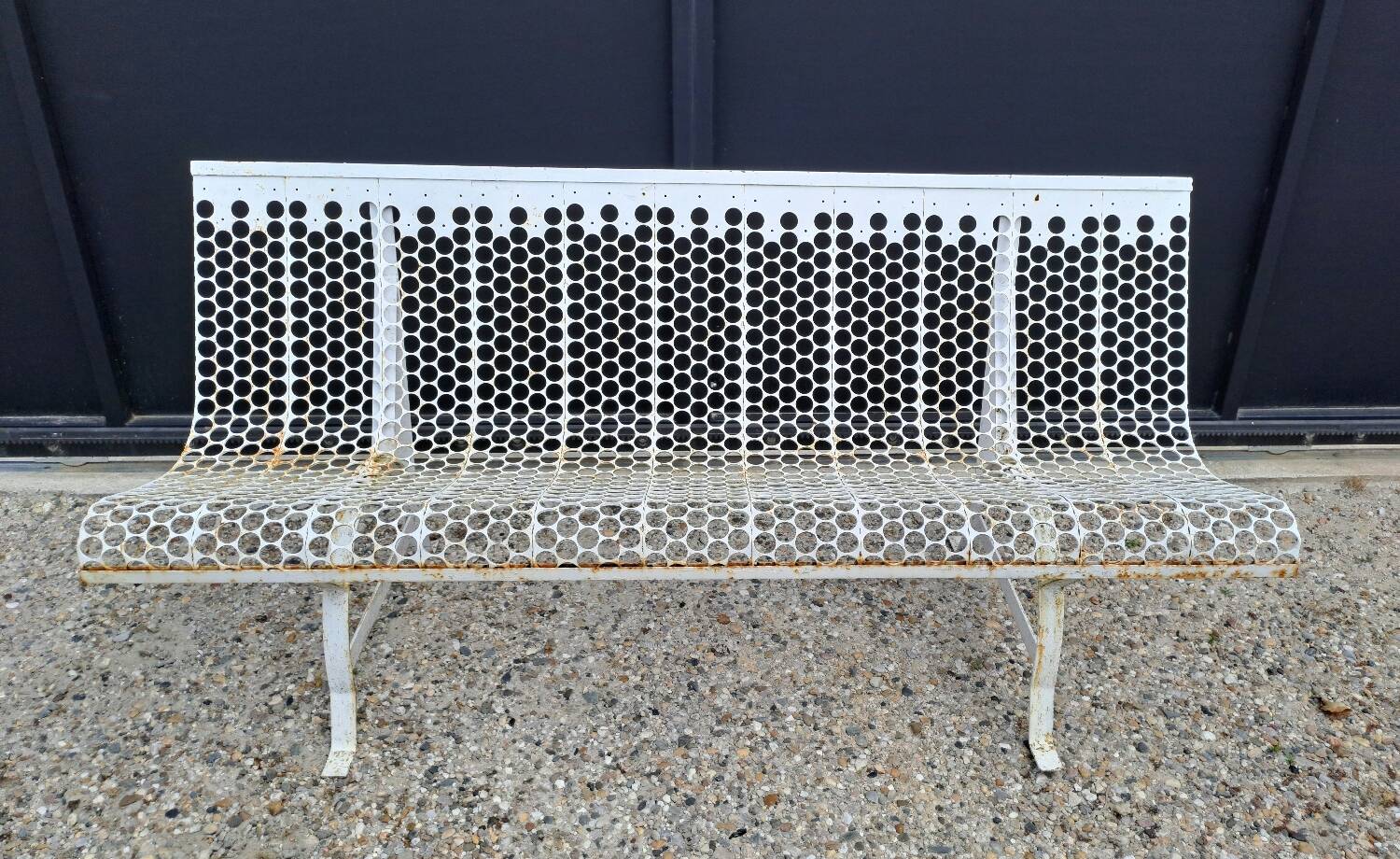 Garden bench in iron and perforated sheet metal