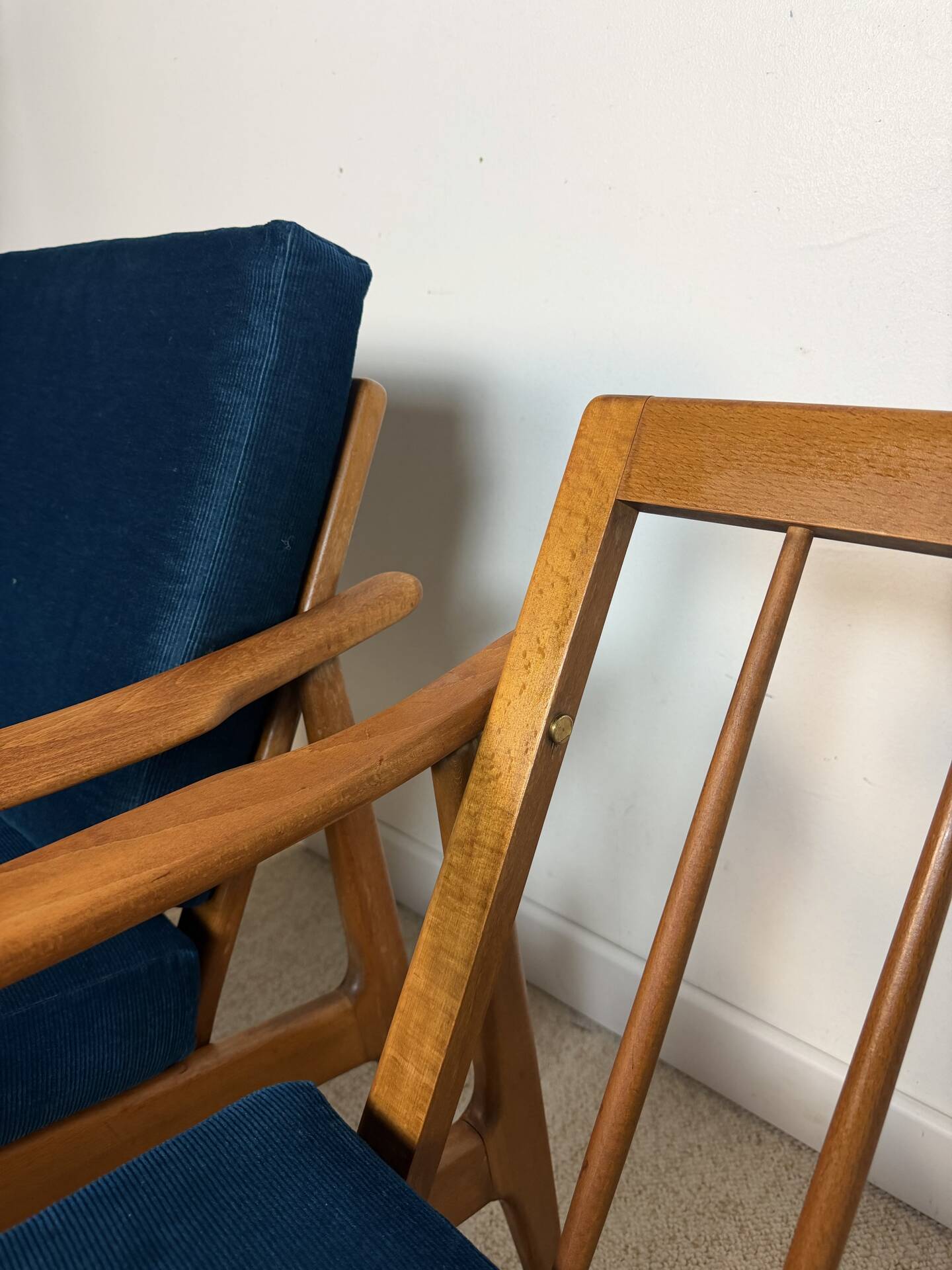 a pair of Scandinavian armchairs in teak from the 1960s