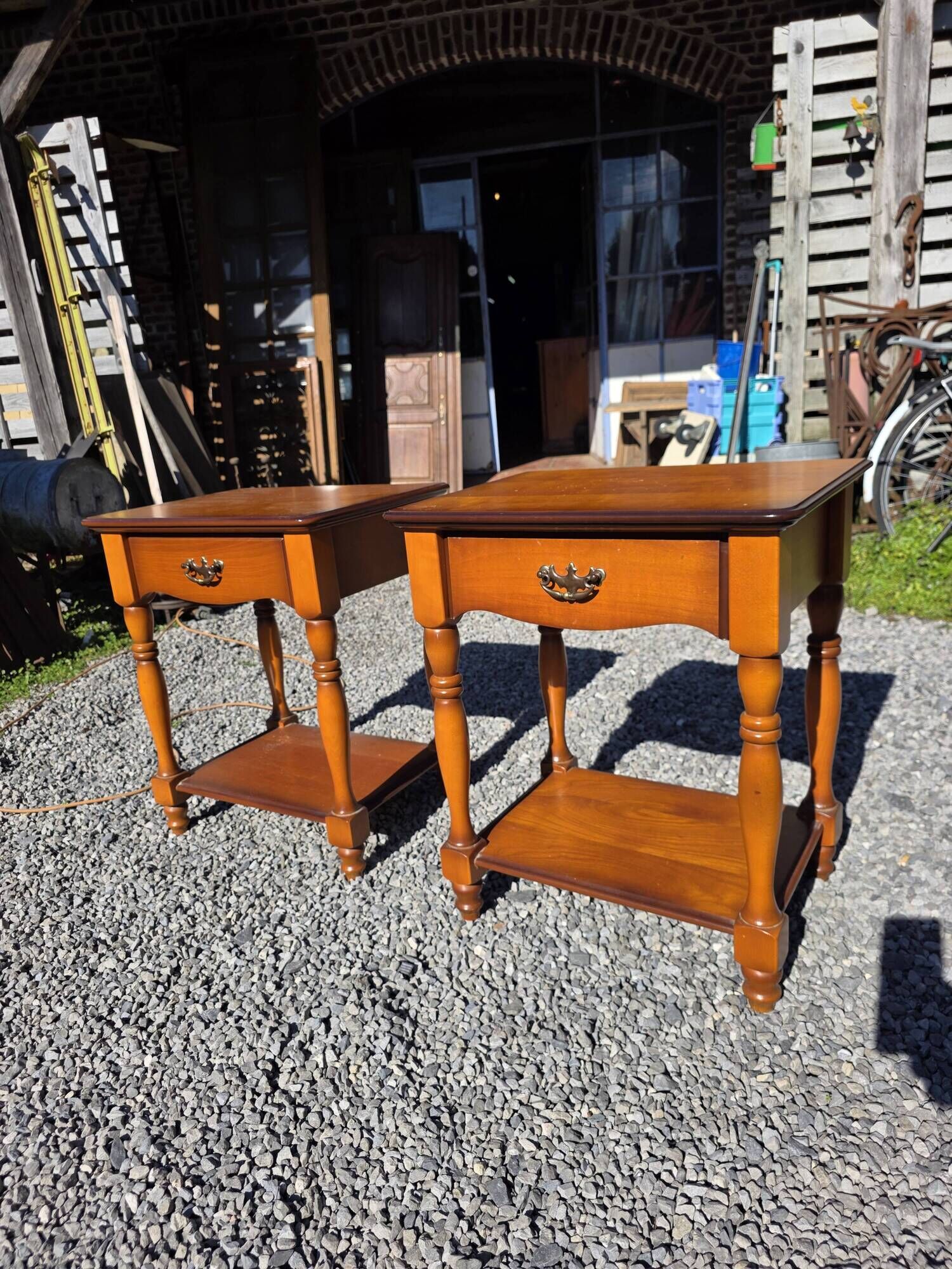 Pair of cherry wood bedside tables from the mid-20th century.